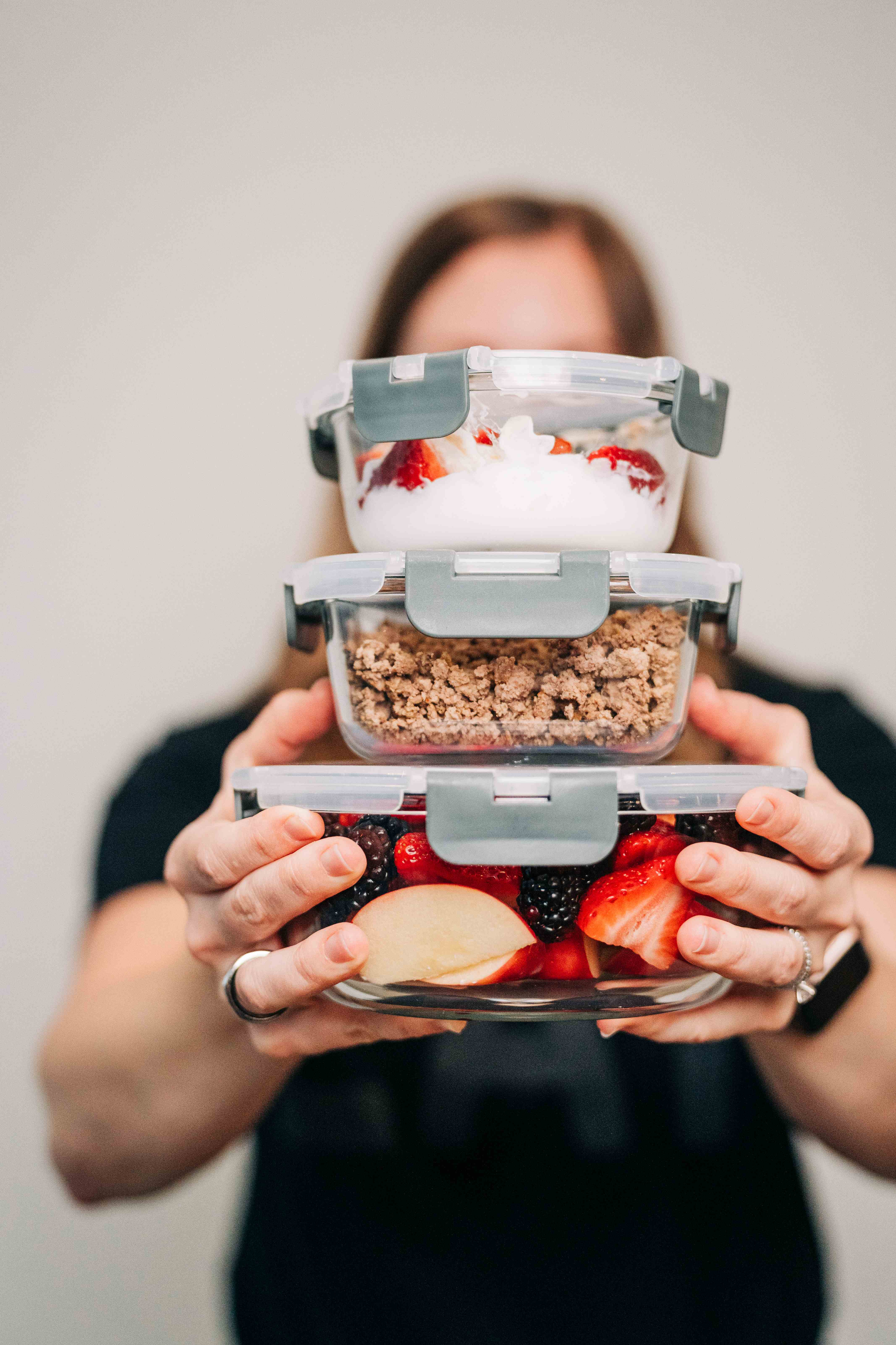 Bekah with meal prep containers